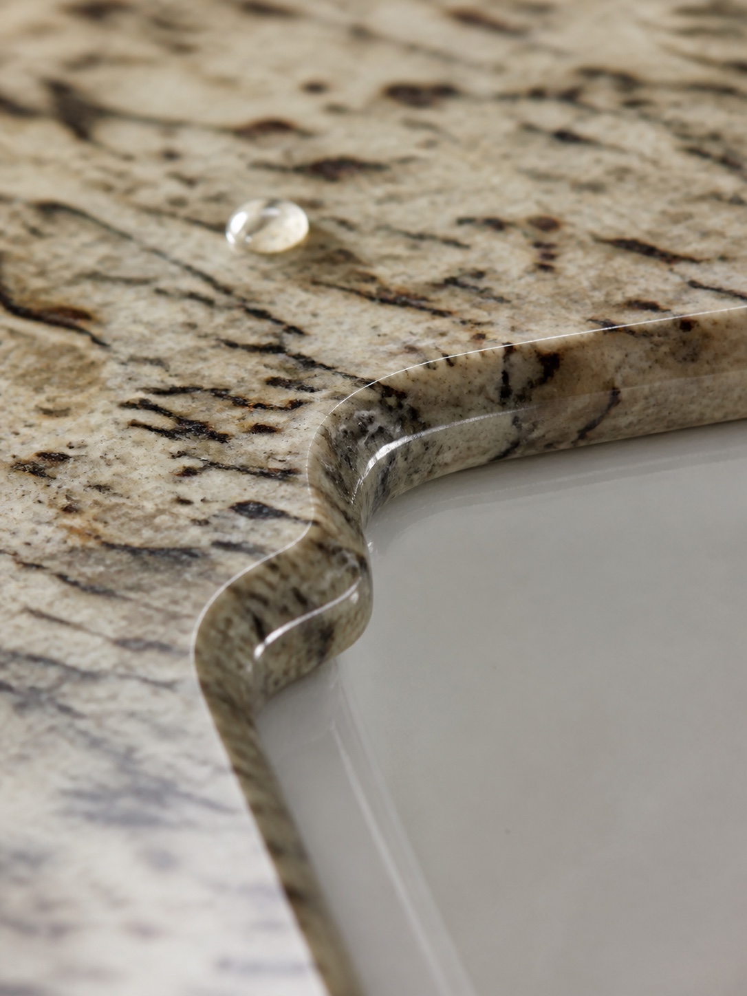 Polished granite edge detail and tight seam