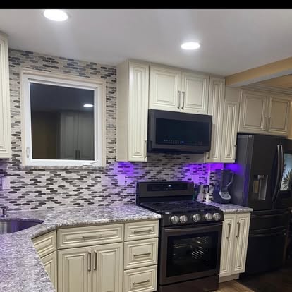 Light kitchen with an accent island — photo 3 of 5, by GT Stone and Cabinets Installation in South Amboy, NJ