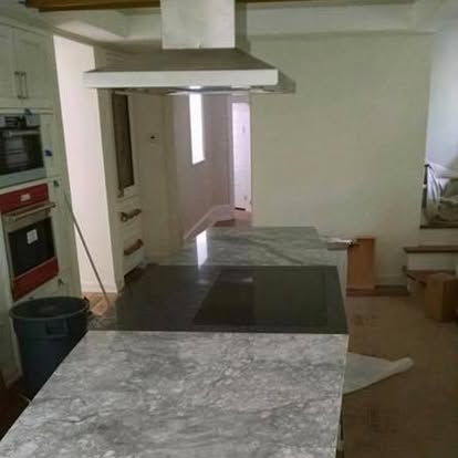 Black granite with a travertine backsplash — photo 4 of 4, by GT Stone and Cabinets Installation in South Amboy, NJ