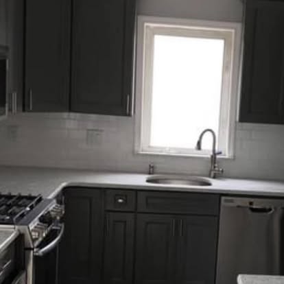 Charcoal cabinets, speckled granite — photo 4 of 7, by GT Stone and Cabinets Installation in South Amboy, NJ