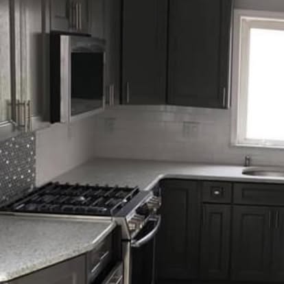 Charcoal cabinets, speckled granite — photo 7 of 7, by GT Stone and Cabinets Installation in South Amboy, NJ