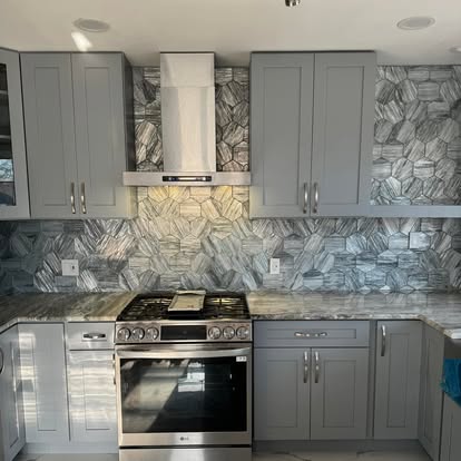 Grey-blue cabinets, quartzite counters — photo 11 of 13, by GT Stone and Cabinets Installation in South Amboy, NJ