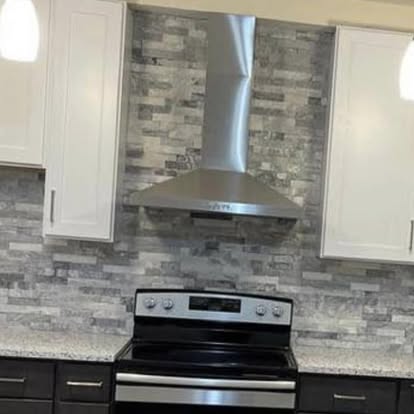 Two-tone kitchen with a stacked-stone accent — photo 3 of 10, by GT Stone and Cabinets Installation in South Amboy, NJ