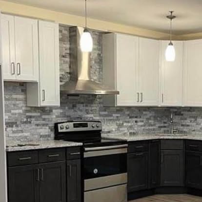 Two-tone kitchen with a stacked-stone accent — photo 7 of 10, by GT Stone and Cabinets Installation in South Amboy, NJ