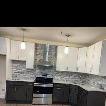 Two-tone kitchen with a stacked-stone accent — photo 8 of 10, by GT Stone and Cabinets Installation in South Amboy, NJ
