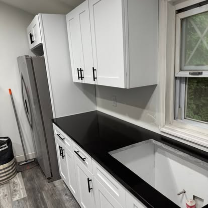 White kitchen, black-and-white quartz — photo 2 of 13, by GT Stone and Cabinets Installation in South Amboy, NJ