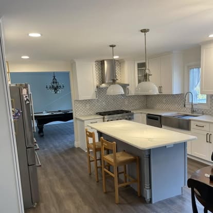 White cabinets with a Calacatta-look island — completed by GT Stone and Cabinets Installation in South Amboy, NJ