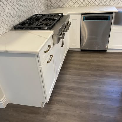 White cabinets with a Calacatta-look island — photo 2 of 19, by GT Stone and Cabinets Installation in South Amboy, NJ
