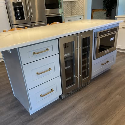 White cabinets with a Calacatta-look island — photo 3 of 19, by GT Stone and Cabinets Installation in South Amboy, NJ