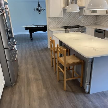 White cabinets with a Calacatta-look island — photo 10 of 19, by GT Stone and Cabinets Installation in South Amboy, NJ