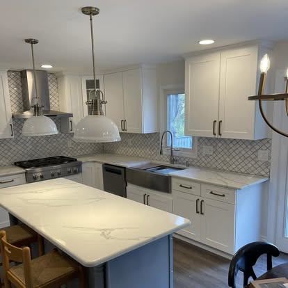White cabinets with a Calacatta-look island — photo 11 of 19, by GT Stone and Cabinets Installation in South Amboy, NJ