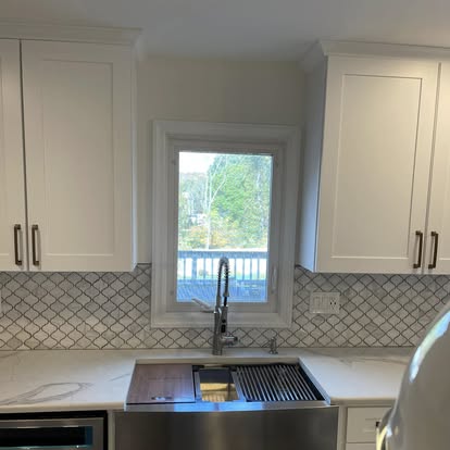 White cabinets with a Calacatta-look island — photo 13 of 19, by GT Stone and Cabinets Installation in South Amboy, NJ