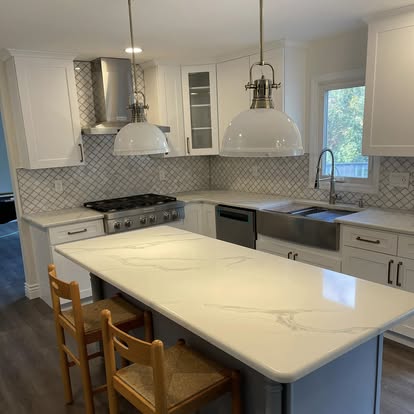 White cabinets with a Calacatta-look island — photo 14 of 19, by GT Stone and Cabinets Installation in South Amboy, NJ
