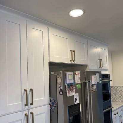 White cabinets with a Calacatta-look island — photo 17 of 19, by GT Stone and Cabinets Installation in South Amboy, NJ