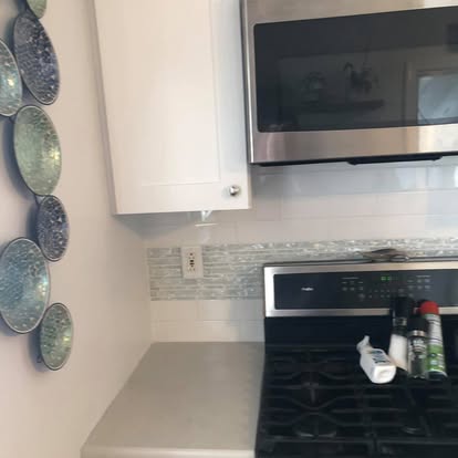 White kitchen with a curved breakfast bar — photo 5 of 13, by GT Stone and Cabinets Installation in South Amboy, NJ