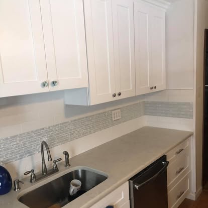 White kitchen with a curved breakfast bar — photo 8 of 13, by GT Stone and Cabinets Installation in South Amboy, NJ