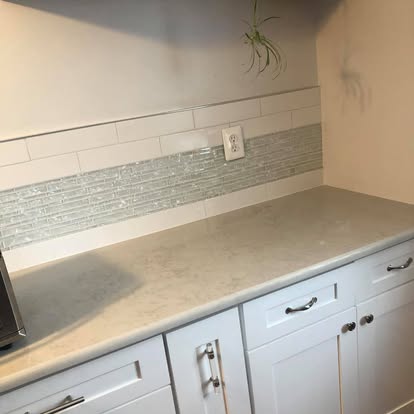 White kitchen with a curved breakfast bar — photo 9 of 13, by GT Stone and Cabinets Installation in South Amboy, NJ