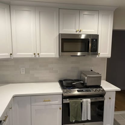 Bright white kitchen under a skylight — photo 3 of 9, by GT Stone and Cabinets Installation in South Amboy, NJ