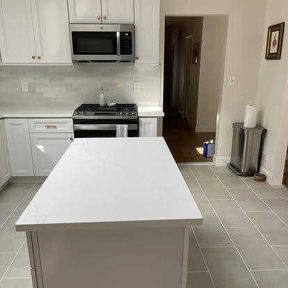 Bright white kitchen under a skylight — photo 5 of 9, by GT Stone and Cabinets Installation in South Amboy, NJ