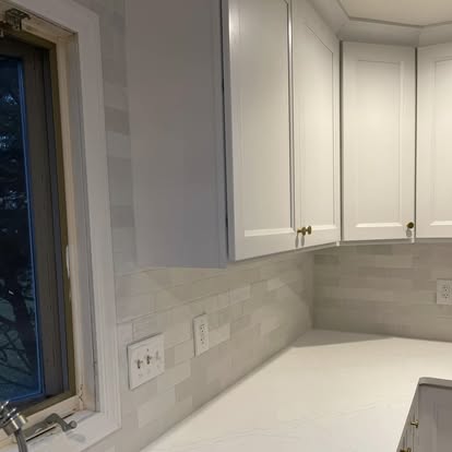 Bright white kitchen under a skylight — photo 6 of 9, by GT Stone and Cabinets Installation in South Amboy, NJ