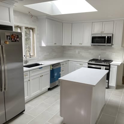 Bright white kitchen under a skylight — photo 9 of 9, by GT Stone and Cabinets Installation in South Amboy, NJ